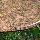 Circular table top in polished Balmoral granite