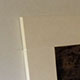 Fire surround with elevated hearth in Portland stone