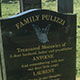 Dark grey granite memorial with small kerb feature Dark grey granite memorial with small kerb feature