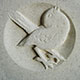 Bird design carved in Portland stone Bird design carved in Portland stone