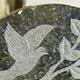 Dove design, hand carved-in blue pearl granite Dove design, hand carved-in blue pearl granite