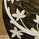 Leaf design carved in Aurora granite Leaf design carved in Aurora granite